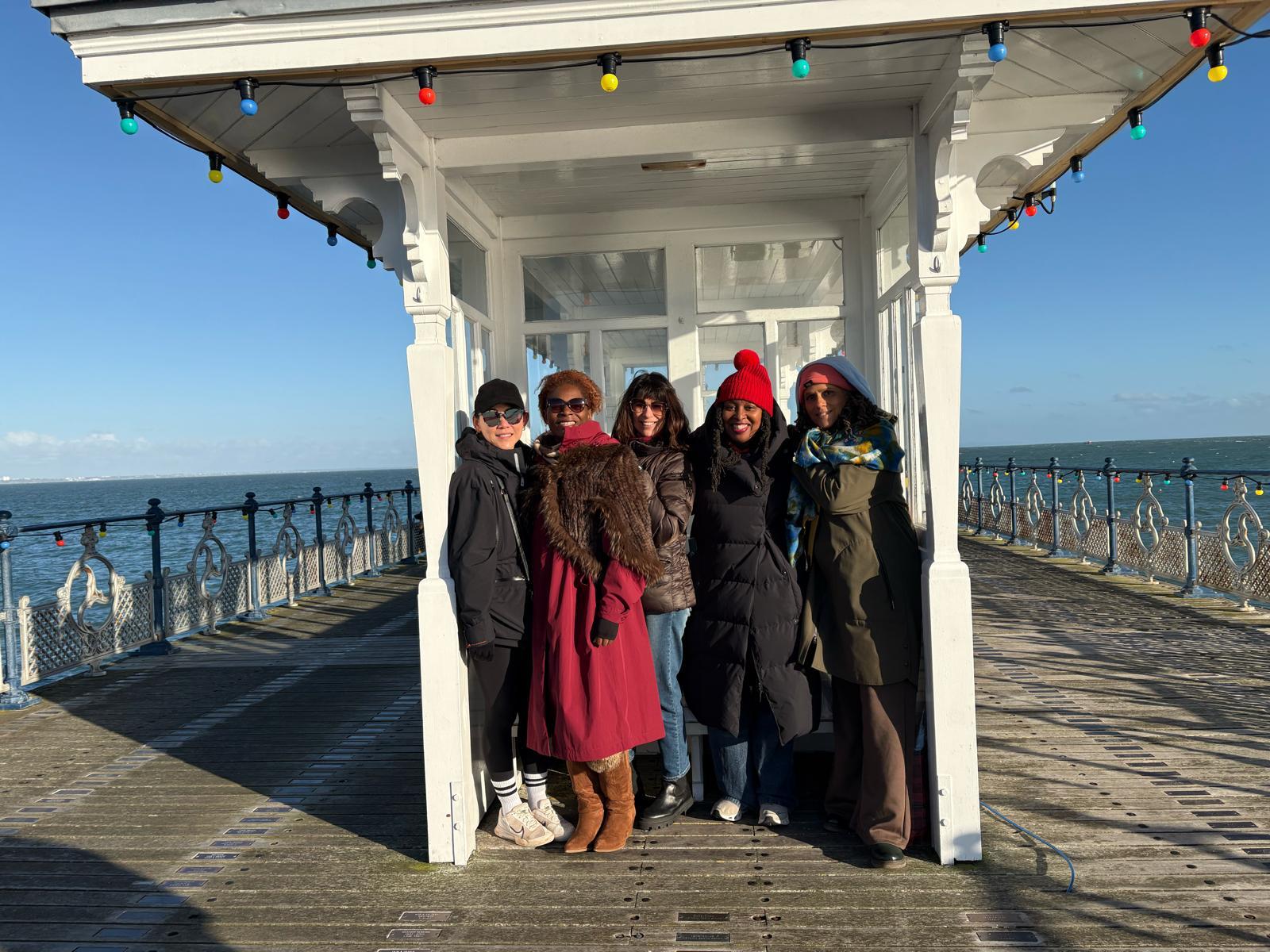 A coaching group by the sea